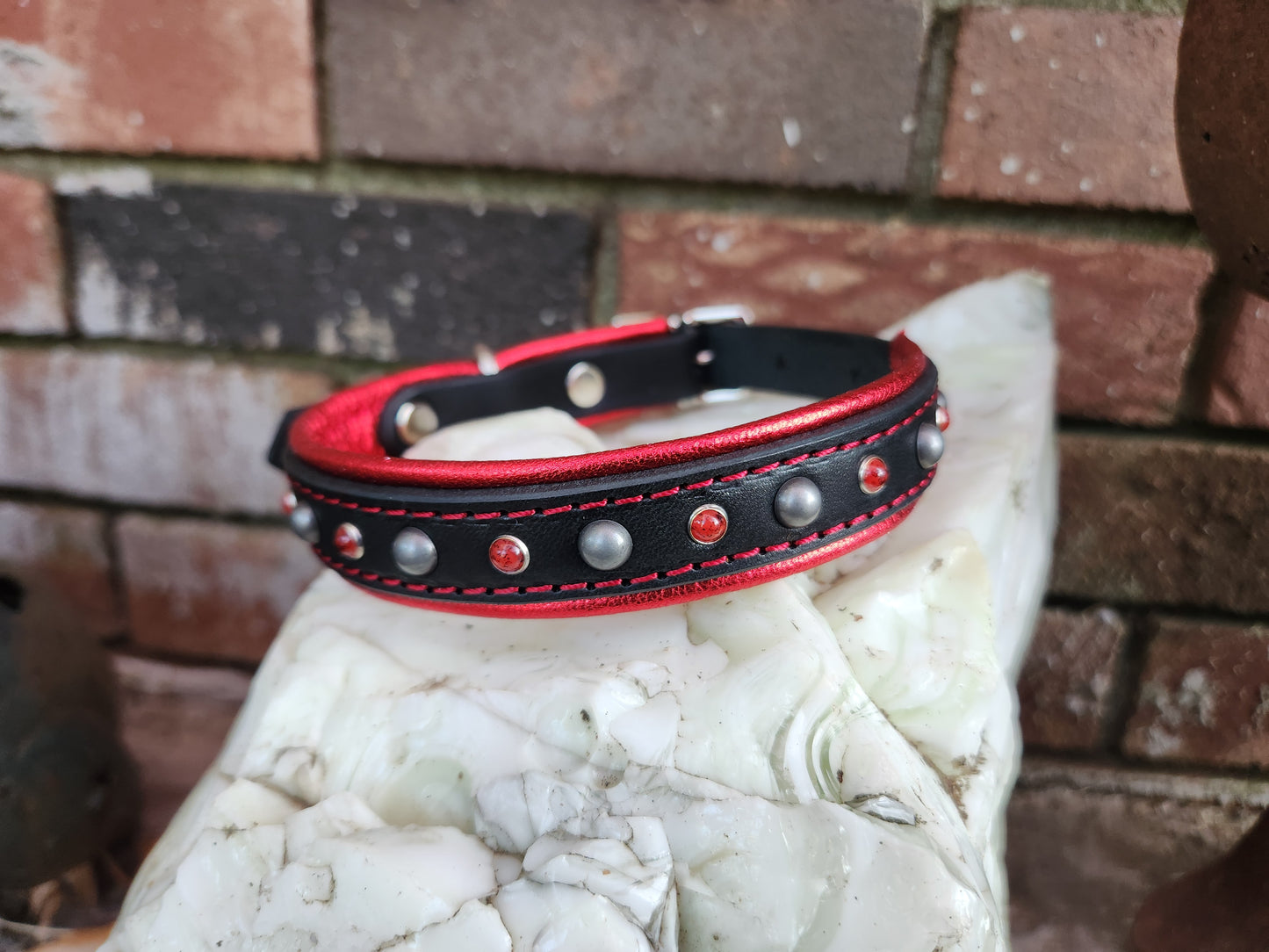 Black Leather Dog Collar with Metallic Red Padding and Stud Detailing