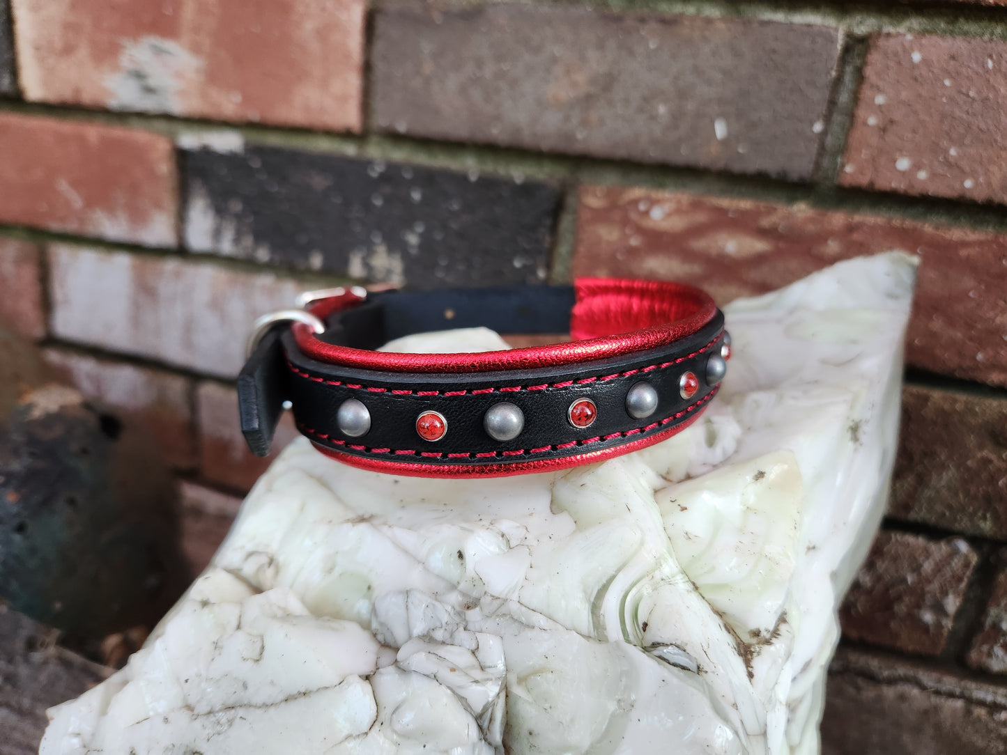 Black Leather Dog Collar with Metallic Red Padding and Stud Detailing