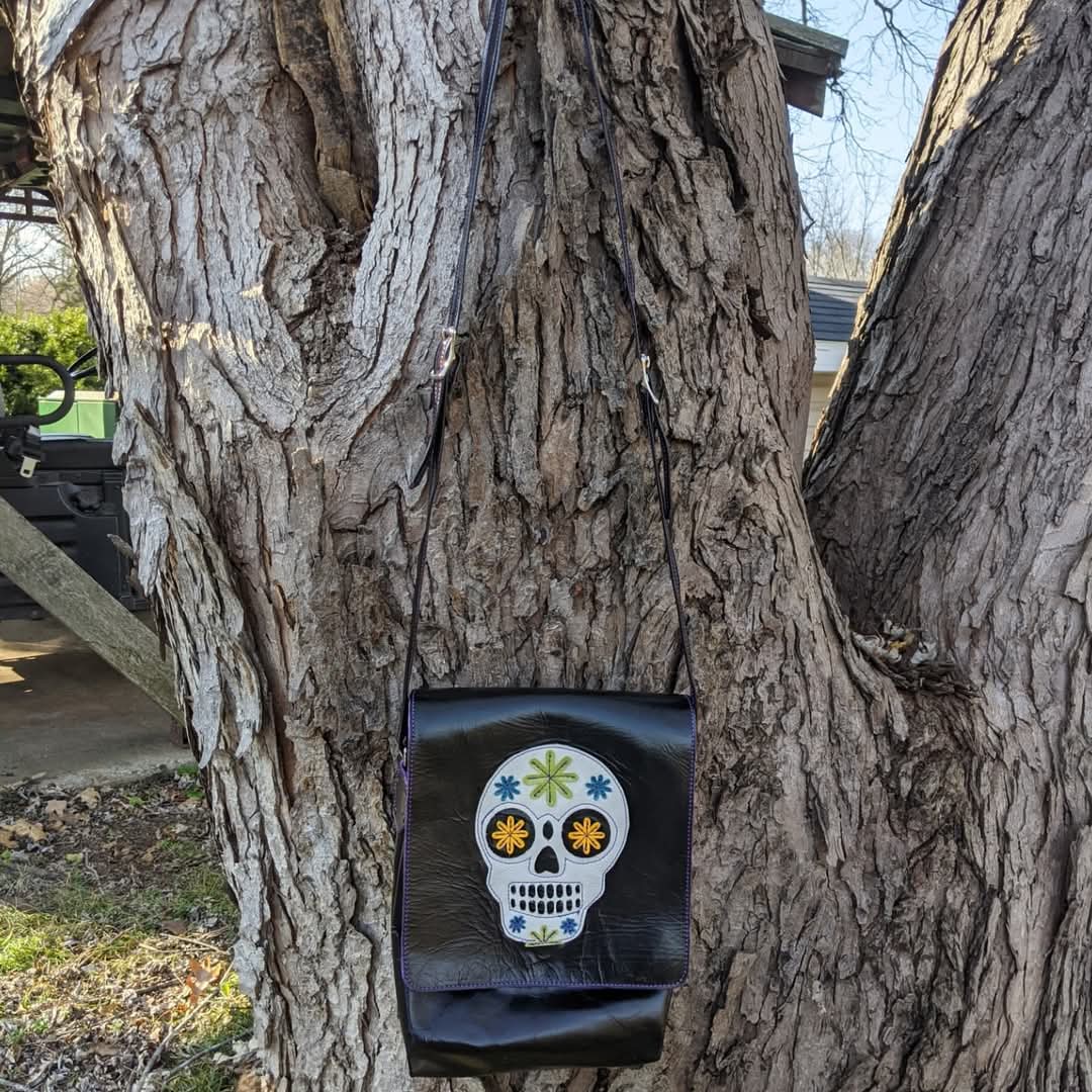 Shiny Black Leather Crossbody Bag with Sugar Skull Appliqué